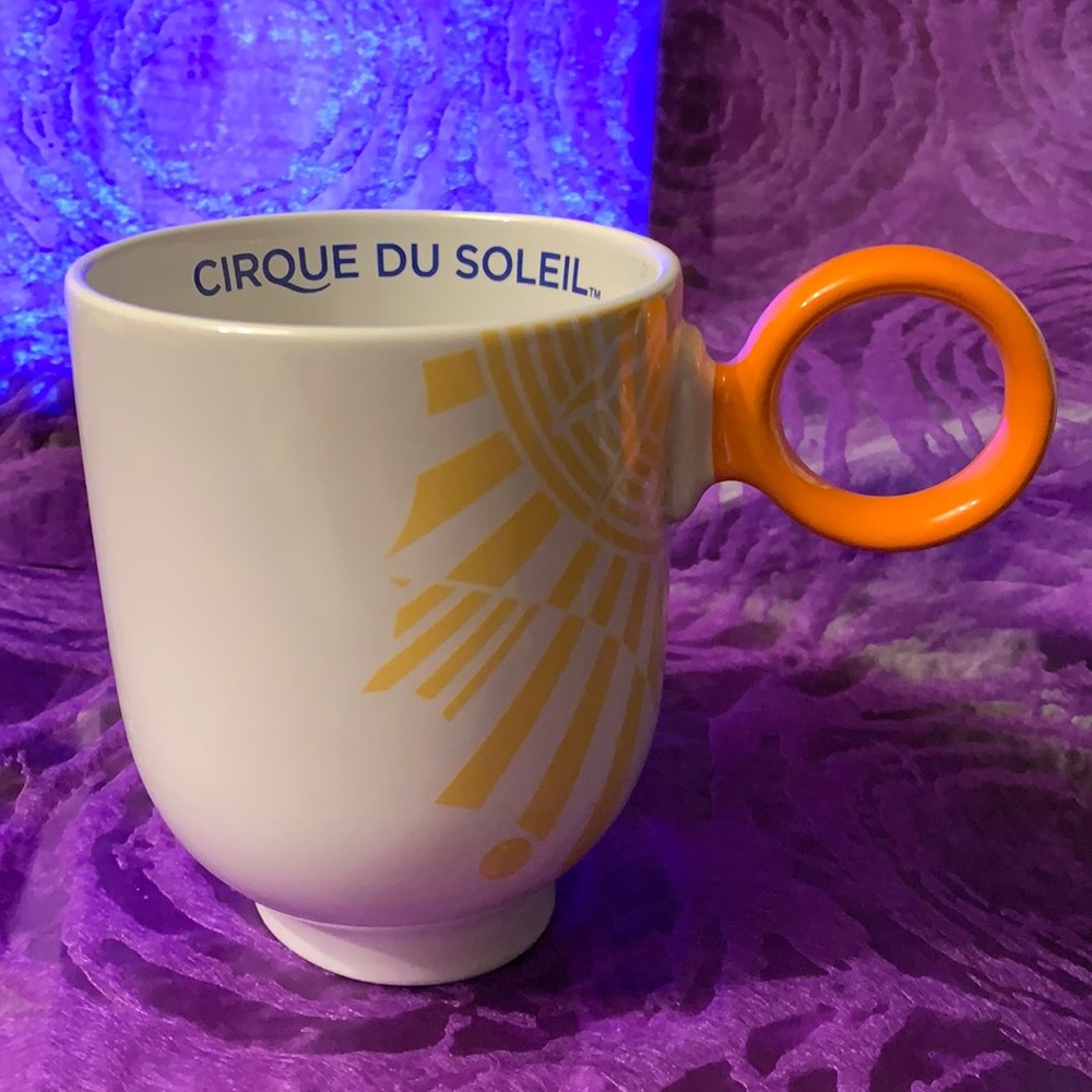 CIRQUE DU SOLEIL Asymmetrical Yellow Orange Sun Ring Handle Coffee Cup Mug 14oz